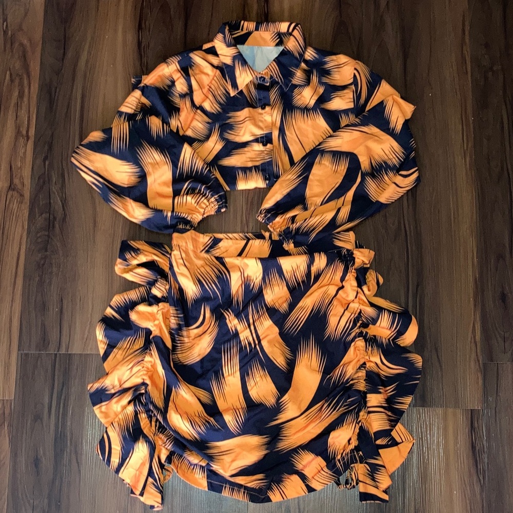 Stylish Orange and Black Women's Top & Ruffle Skirt Set